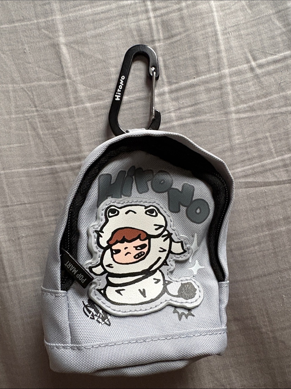 Hirono Light Gray Canvas Frog Pouch with Black Carabiner Bag Charm.